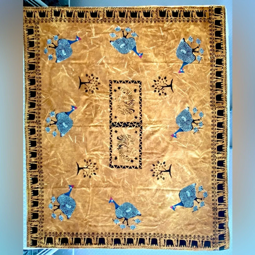 New from South Africa hand decorated table cloth with bird and elephant design.